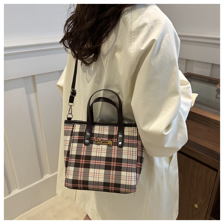 Cross-border personalized hand-carried fashionable and casual bucket bag for women, new autumn 2024 collection, contrasting color striped single-shoulder quality crossbody bag undefined