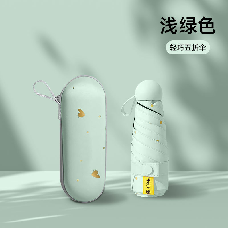 Paraguas de protección UV femenino paraguas de protección solar plegable de plástico negro en stock Paraguas de sol femenino portátil pequeño estudiante