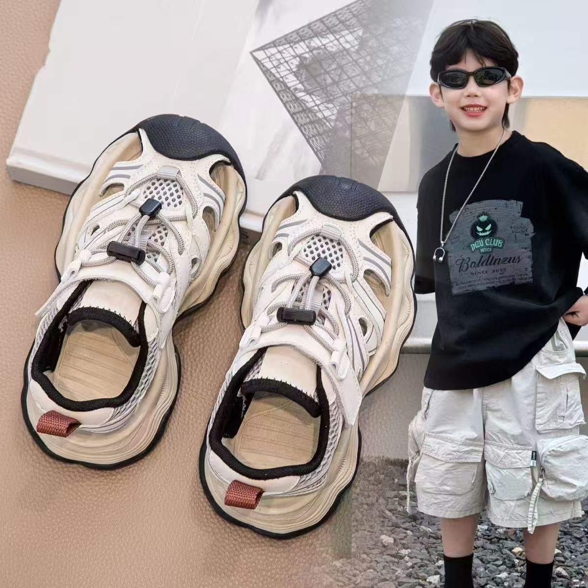 Sandalias deportivas para niños 2026 verano nuevo niño Baotou zapatos de retroceso zapatos de playa de moda para niñas zapatos de playa