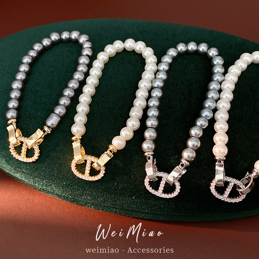 Pulsera de perla de nariz de cerdo de piedra de diamante redonda, pulsera ligera y lujosa, pulsera de nicho, joyas de moda versátiles.