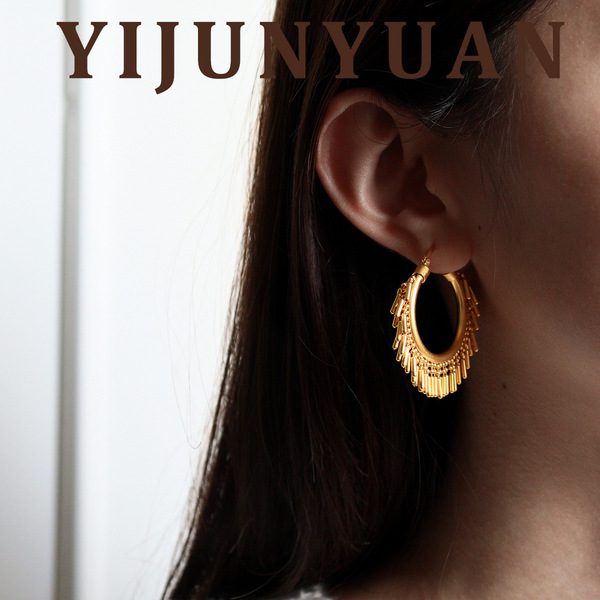 Retro fashionable golden small design earrings with tassels