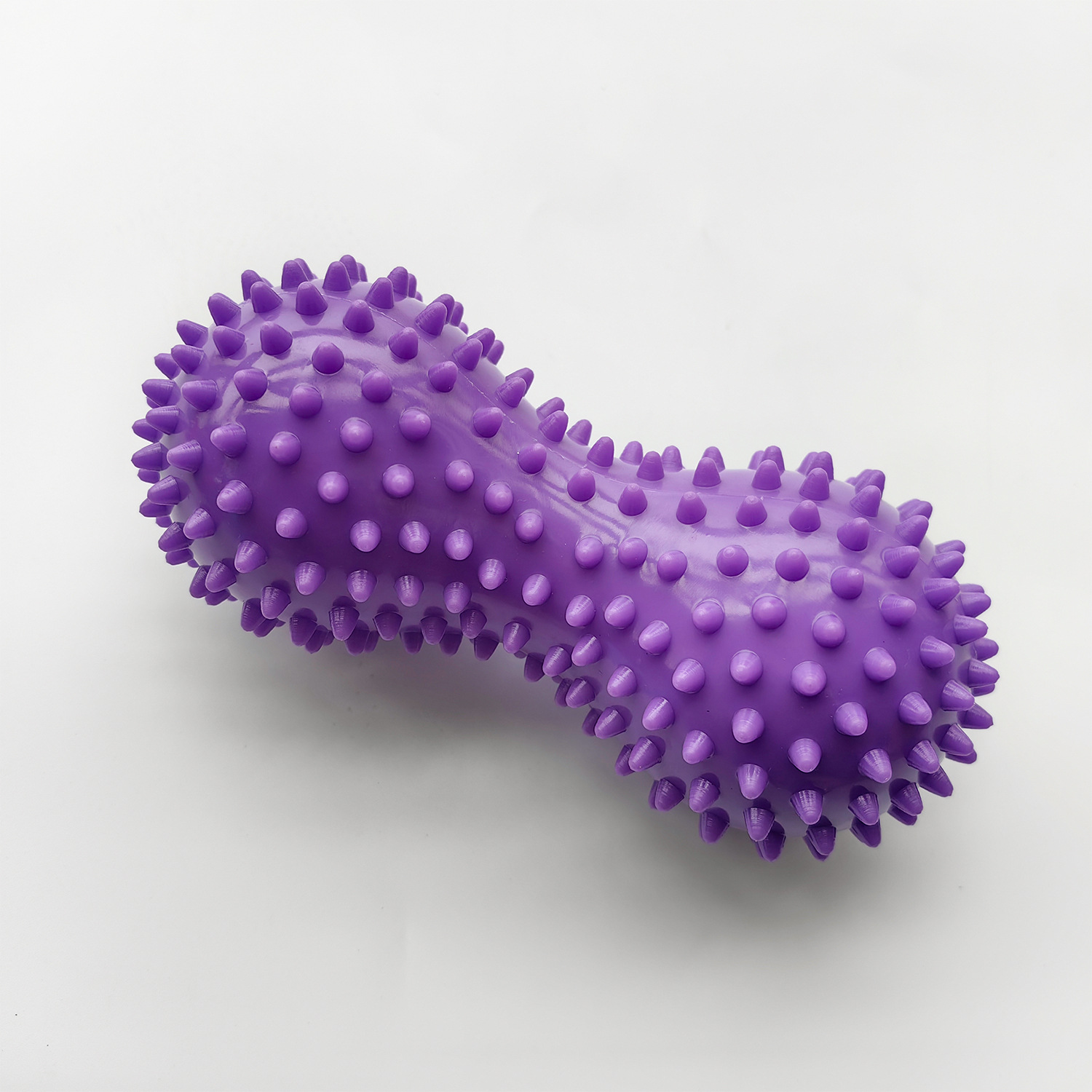 Purple peanut spiked ball