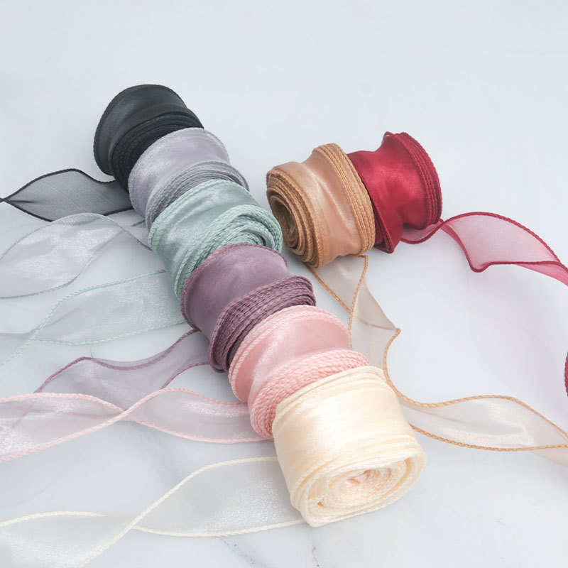 Fábrica en stock Venta caliente 4cm hilado curvado con flores material de embalaje de regalo con cinta de flores elegante hilo de cola de pescado