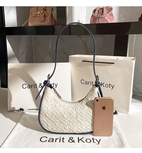 Hong Kong MrCKJHOSEl This year's popular pleated bags for women, summer niche design, crescent bag, underarm bag, single shoulder