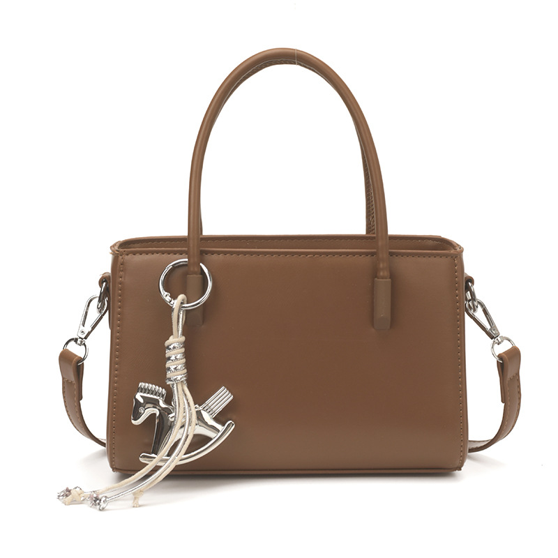 Diseño coreano de nicho bolso de mano casual para mujeres 2026 verano diario nuevo estilo de moda bolso de transporte