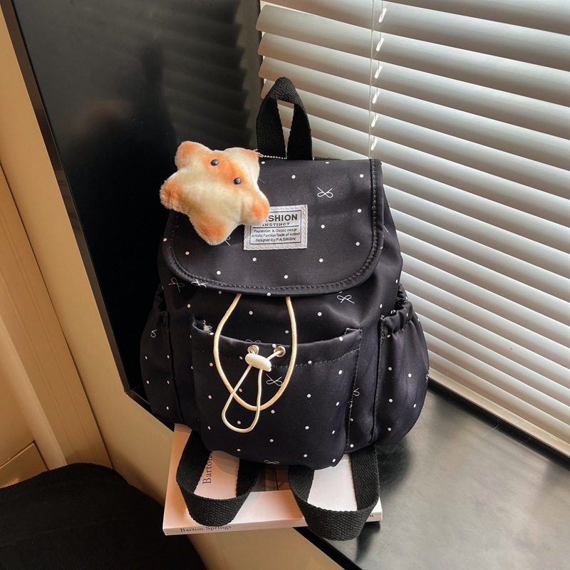 Mochila de la atmósfera pequeña onda punto arco de cuerda de dibujo simple mochila de viajes de viajes de viajes de la universidad pequeña mochila de mujeres