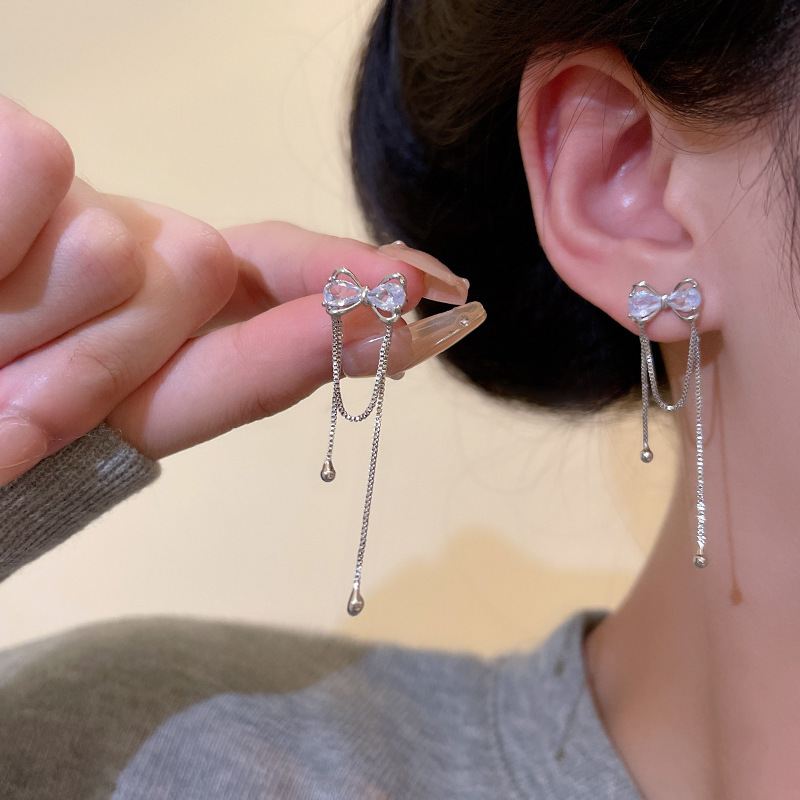 Pendientes de borla de circonio con garra de sentido avanzado de plata 925 Pendientes largos de temperamento de nicho de lujo ligero femenino Pendientes delgados de cara redonda