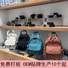 新款纯色牛津布双肩包女轻便简约百搭休闲学生书包帆布包