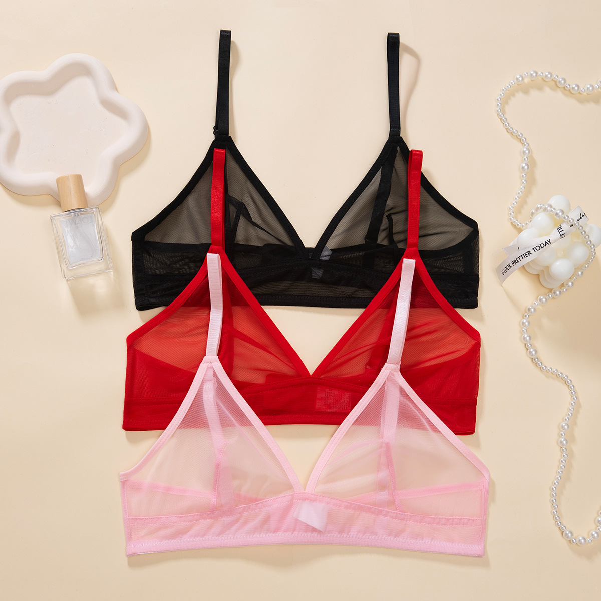 Europa y los Estados Unidos al por mayor malla transparente ropa interior de mujer extranjera delgada encaje bra sin anillo de acero bra de copa triangular