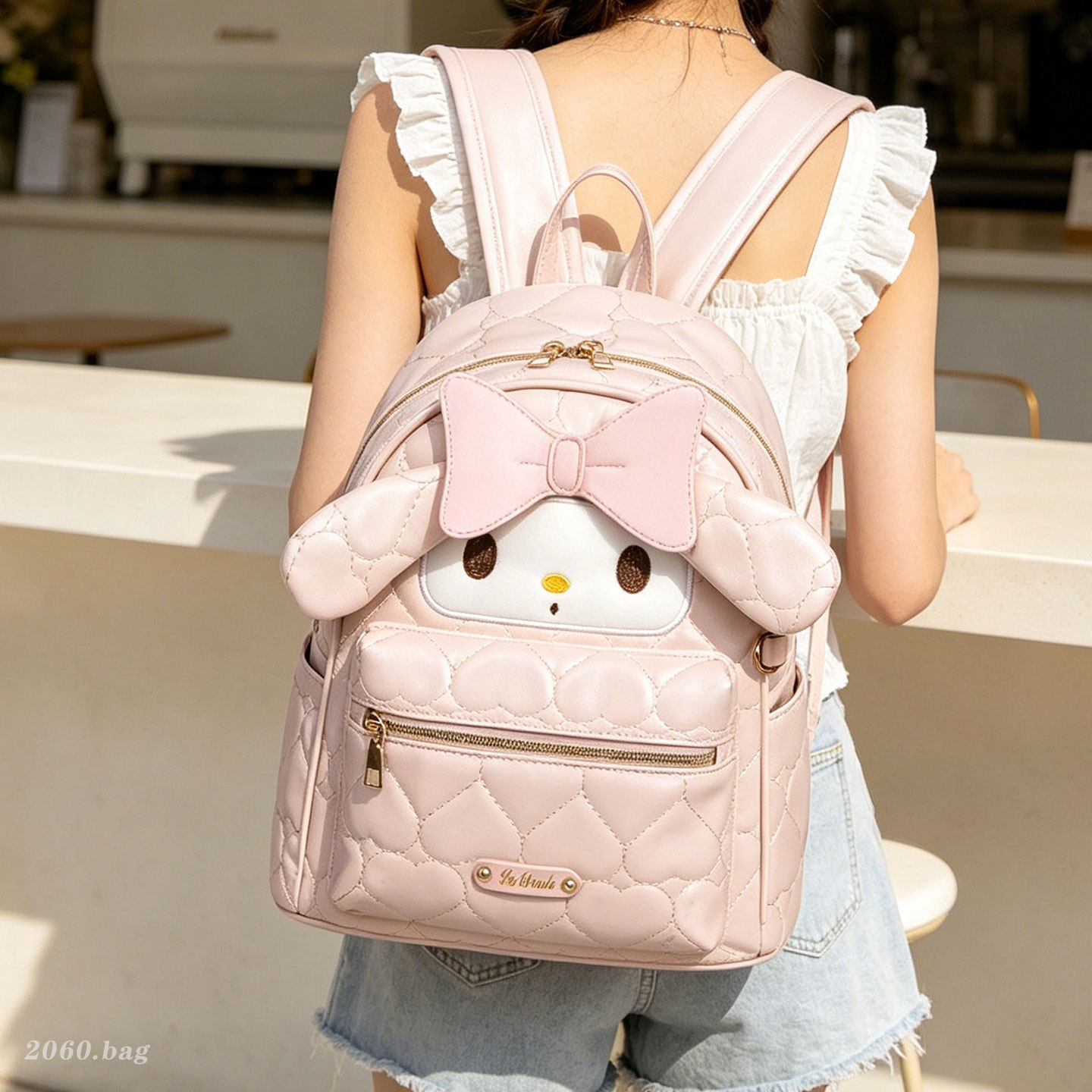 Mochila de gran capacidad para estudiantes de verano 2026 nuevo dulce arco versátil Mochila de alta calidad