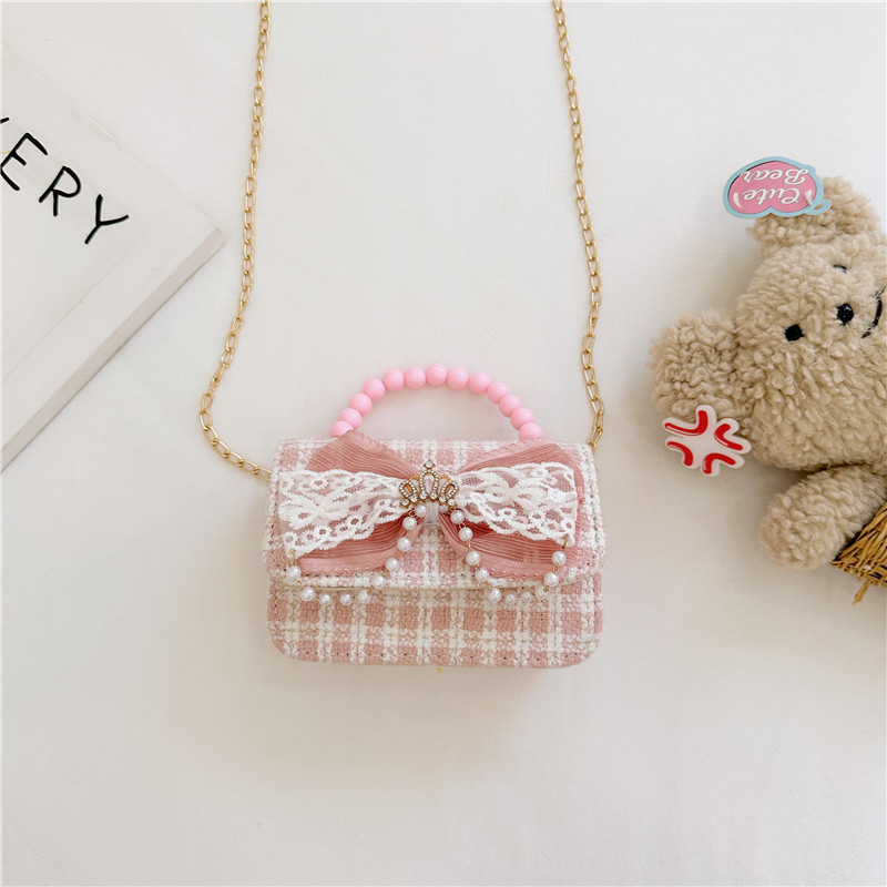 2024 nueva moda lindas bolsas de hombro para niños bolsas de perlas a cuadrícula bolsas extranjeras bolsas de hombro para niñas gran capacidad marea