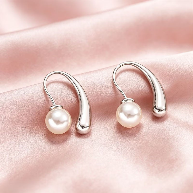 Pendientes de botón con perlas de acero inoxidable mujer_voghion.com