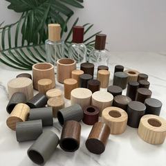 メーカーは木質香水瓶の蓋を提供しています。