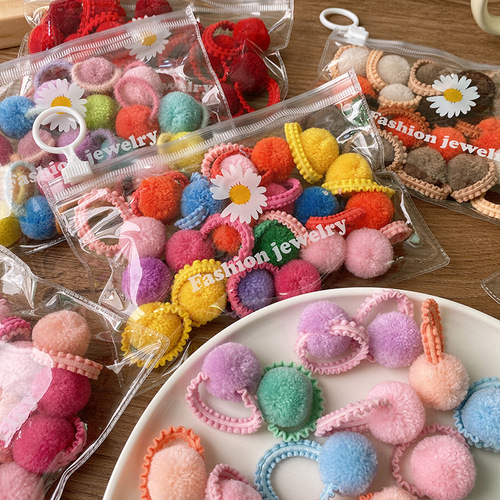 20 bags of macaron candies, colorful autumn and winter plush balls, small fungus-edged hair ties for children, all-match headbands