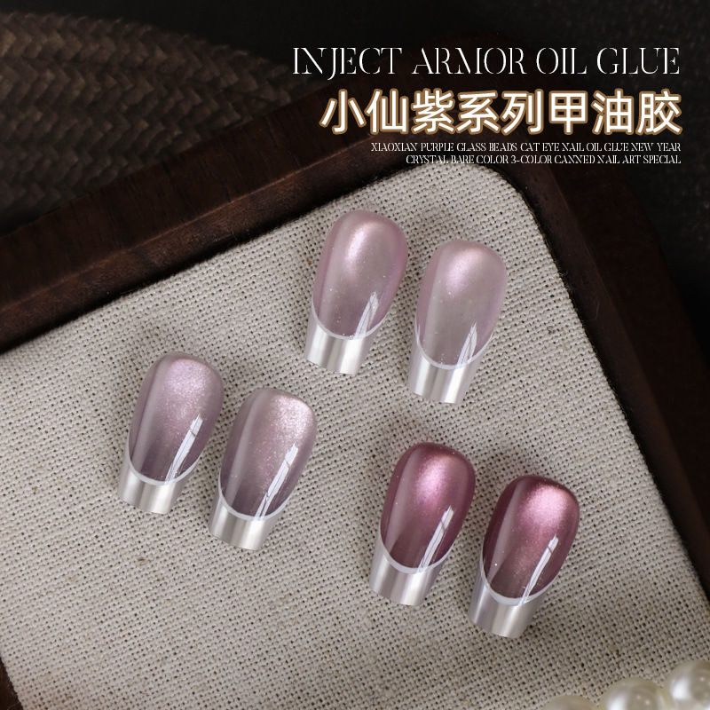 Arte de uñas nuevo estilo pequeño hada púrpura ojo de gato esmalte de uñas textura brillante polvo de frotamiento tridimensional desechable pegamento de uñas pintado en relieve al por mayor