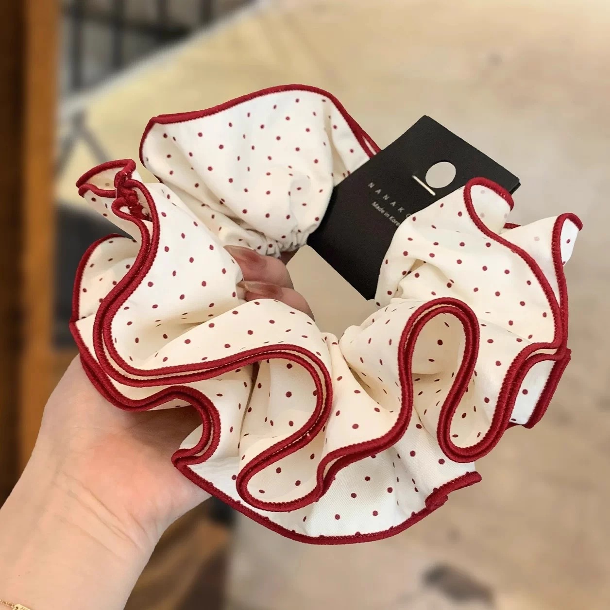 17# midi burgundy polka dot hair tie with red trim, approximately 16cm