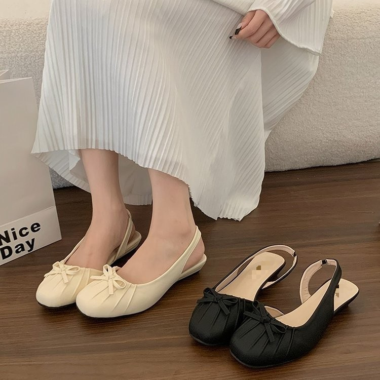 2026 nuevo arco francés con cabeza de media zapatilla mujer de verano usar tacones bajos suaves con falda sandalias huecas