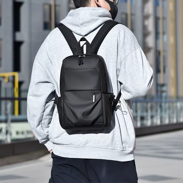 Cross-Border Men's bag black leather film Small backpack casual Simple Men's backpack European and American fashion small schoolbag wholesale
