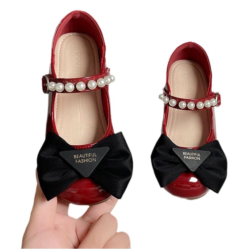 Zapatos de una sola capa para niñas zapatos de princesa 2023 Primavera y otoño nuevos zapatos de suela blanda para niños zapatos de verano bebé arco perla zapatos de cuero