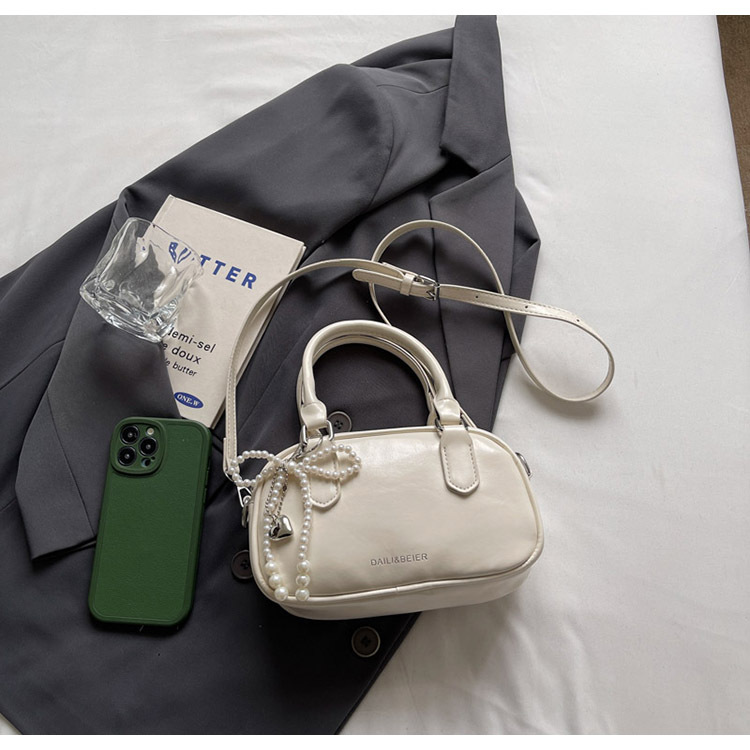 A fashionable Korean-style small square bag for women in the summer of 2025, featuring a simple and retro single-shoulder, crossbody and hand-held pillow bag undefined