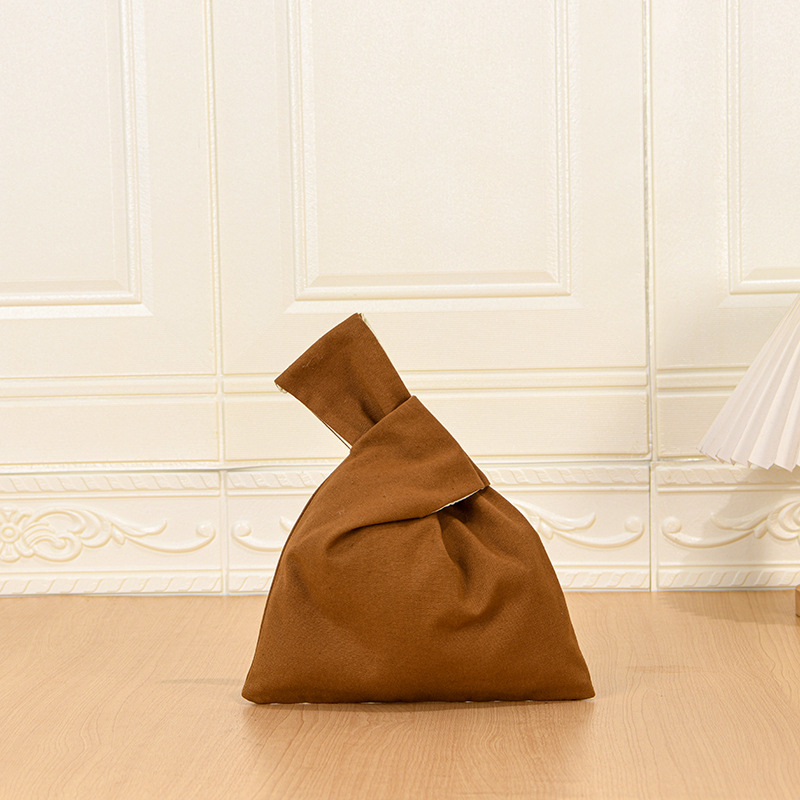 Bolsa de mano con color café 31 de altura * 22 cm de ancho