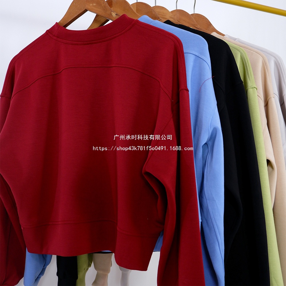 Lulu-style new yoga top for women, featuring a round neck, a flattering drape, and a high-stretch, loose fit, suitable for both sports and casual wear
