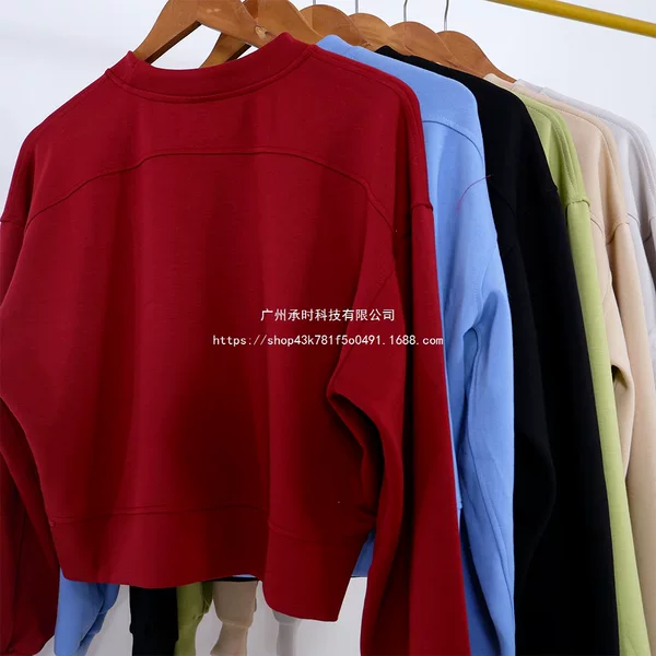 Lulu-style new yoga top for women, featuring a round neck, a flattering drape, and a high-stretch, loose fit, suitable for both sports and casual wear