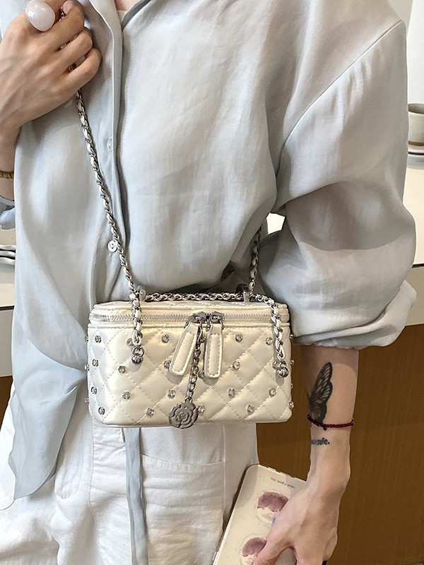 Xiaoxiang estilo de diamantes bolsos de moda de cadena para mujeres 2026 nueva textura de alta calidad de moda con diamantes bolsos de mochila cuadrados