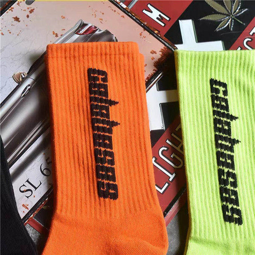 Socks men's autumn and winter ins trendy socks European and American couples mid-calf socks coconut white letter basketball socks Kanye's same style