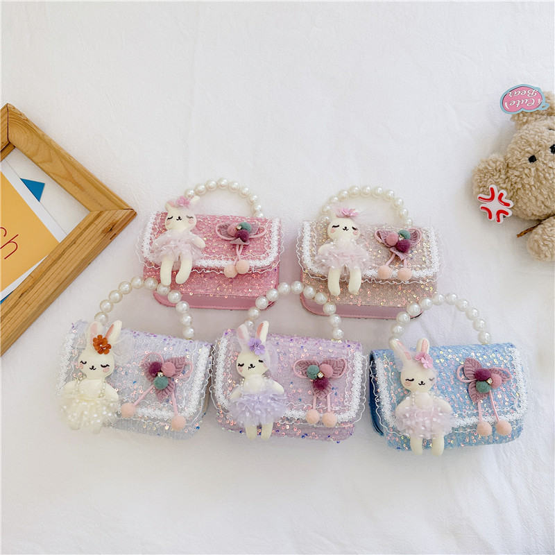 Nuevos niños estilo Chanel estilo bolsa moda perla bolso de hombro de dibujos animados muñeca bolsa de mensajero cadena