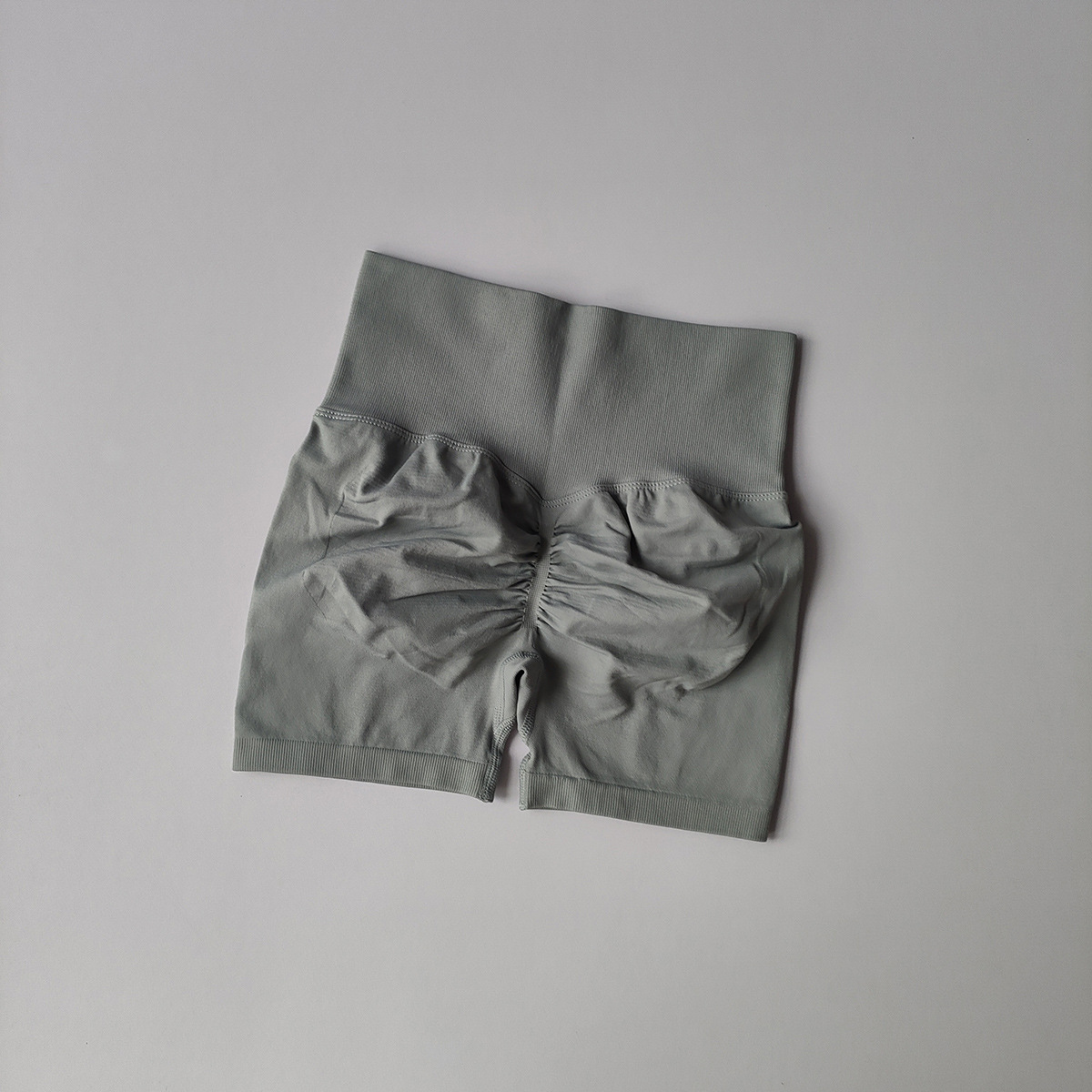 Europa y los Estados Unidos, los pantalones cortos deportivos para mujeres, cintura alta, abdomen reducido, entrenamiento para correr, pantalones cortos de tres puntos de secado rápido