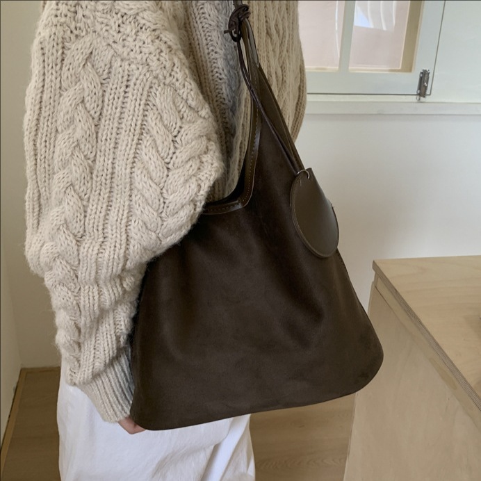 Bolsa de cubo retro transfronteriza para mujeres otoño y invierno 2025, nueva moda, bolso de hombro de moda, bolso de abrigo casual universal