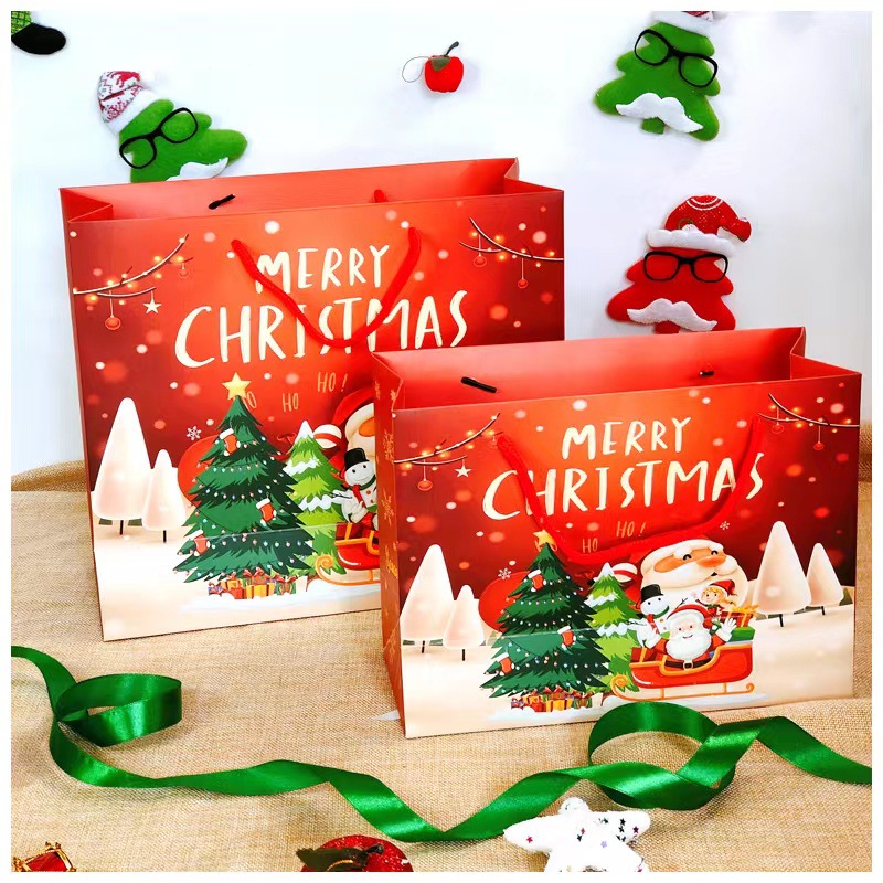 Nueva bolsa de regalo de Navidad bolsa de embalaje de regalo bolsa de papel Lindo bolso rojo de dibujos animados