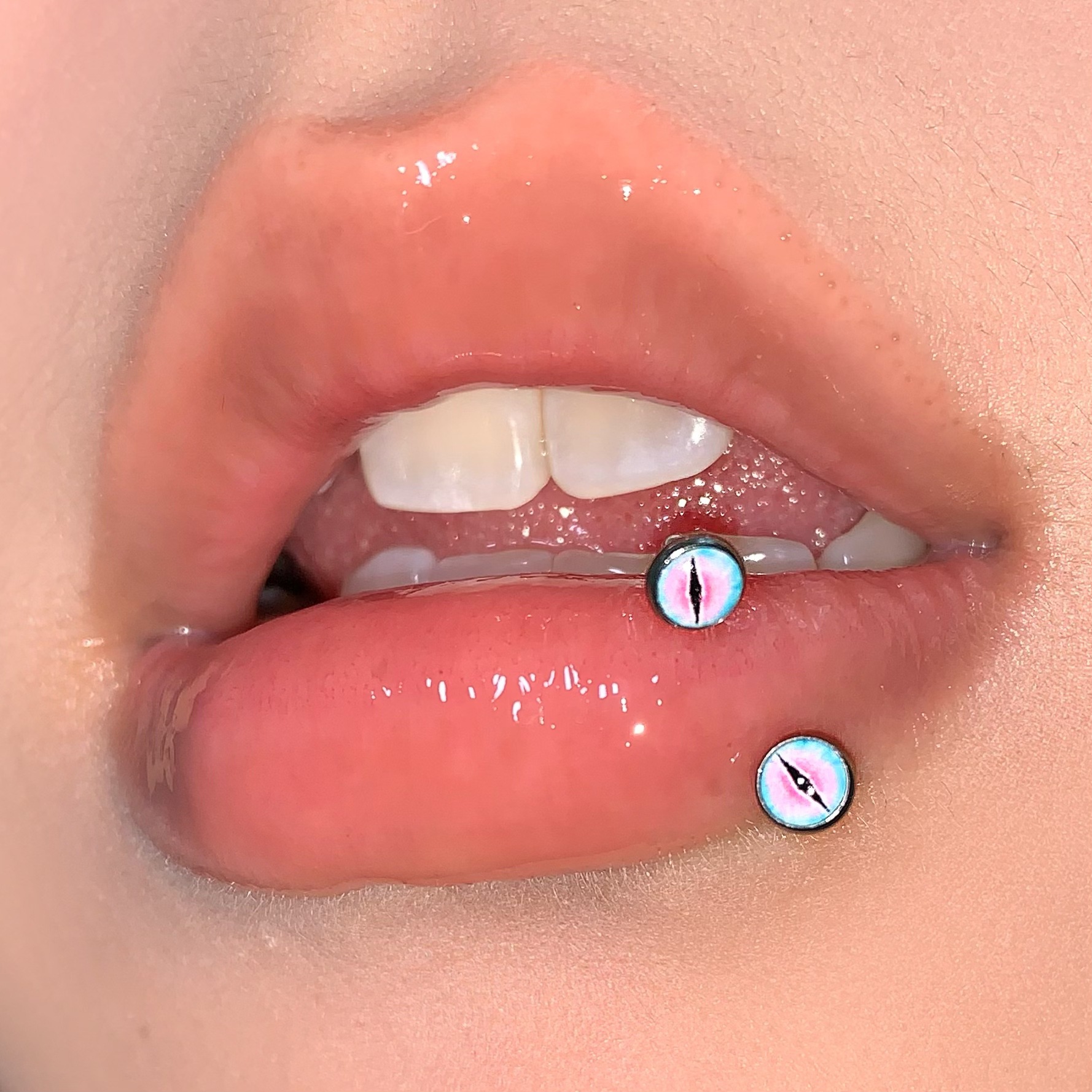 Silver pointed spike labret stud material detail