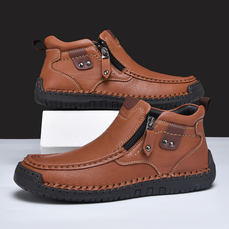 Nuevos zapatos casuales de hombre con cremallera lateral, botas cortas de moda, zapatos al aire libre de tamaño grande, invierno de comercio exterior transfronterizo 2025.