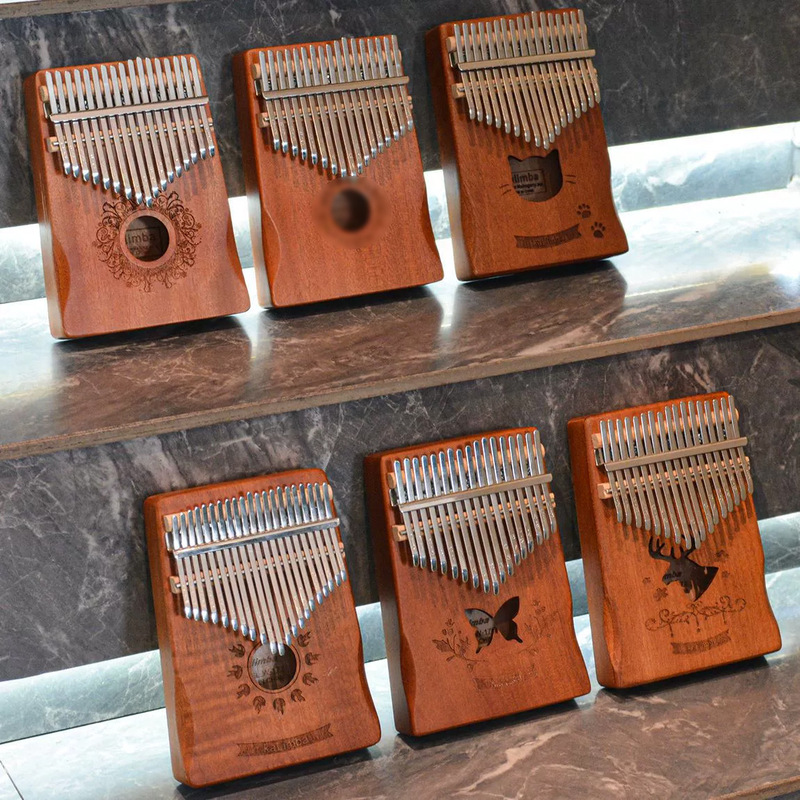 Finger Piano 17 Key Portable Five-Finger Piano Kalimba Piano Peach Blossom Core Finger Piano 21 Tone suit Mini Thumb Piano Finger Piano 17 Key Portable Five-Finger Piano Kalimba Piano Peach Blossom Core Finger Piano 21 Tone suit Mini Thumb Piano