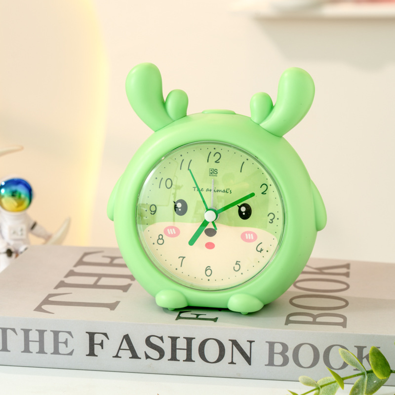 Fábrica directa de cuerno de ciervo despertador de dibujos animados color caramelo silencioso con lámpara despertador para estudiantes WenChuang pequeño despertador especial