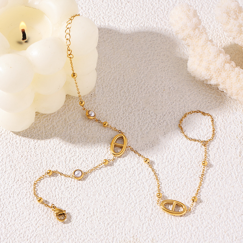 Tina Amazon explotador transfronterizo de acero inoxidable chapado en oro de 18 quilates pulsera de dedos nicho cerdo diseño nariz joyería de mano mujer