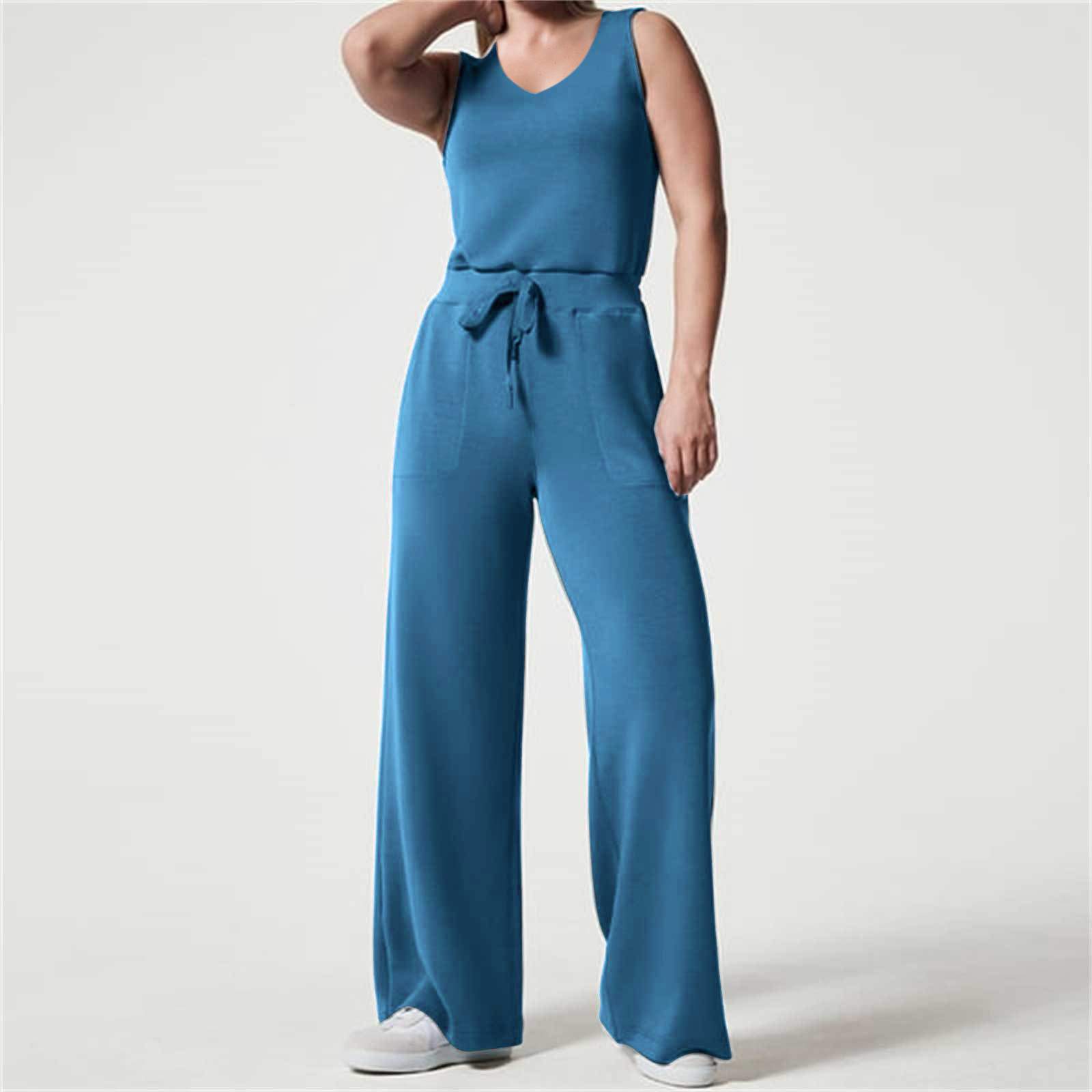 2023 primavera y verano nuevo versátil moda europea y americana adelgazamiento ocasional de las mujeres sin mangas color sólido V-cuello pantalones jumpsuit