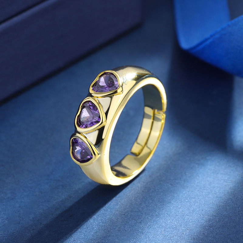 Zhuang Sheng joyas cobre inferior chapado en oro estilo coreano ins moda europea y americana colorido tesoro oro en forma de corazón anillo abierto hembra