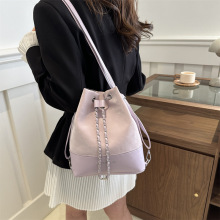 女双肩包2024新款高级感小众百搭链条后背包单肩手提水桶包旅行包