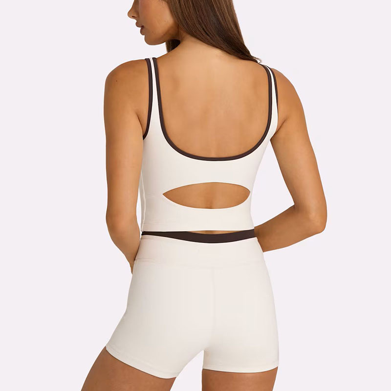 Europa y los Estados Unidos rápidamente seco transpirable color contraste diseño de borde cintura alta abdominal cruzado pantalones de ciclismo entrenamiento para correr conjunto de fitness