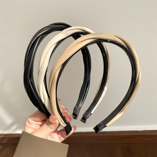 High-end leather twist headband female internet celebrity 2024 new high skull pressure hair headband hairpin retro headwear