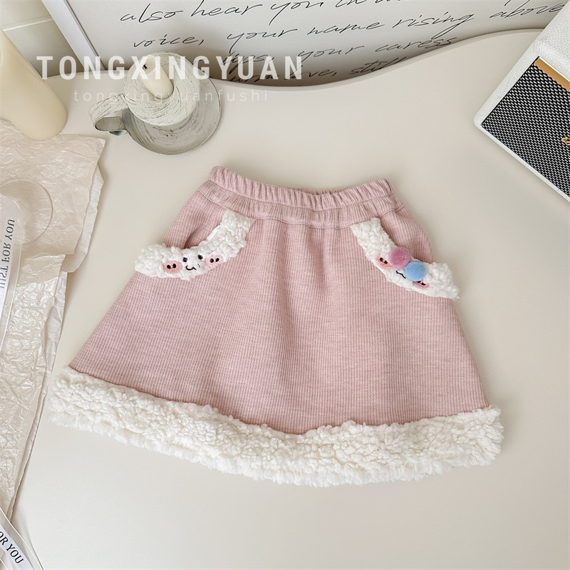 Niños estrella redonda falda de niña 2024 otoño y invierno ropa coreana de color sólido extranjero falda de cinturón para bebés con una falda corta gruesa de lana
