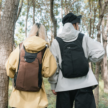 秋季新款小众韩系ins纯色简约背包情侣轻便通勤百搭大容量双肩包