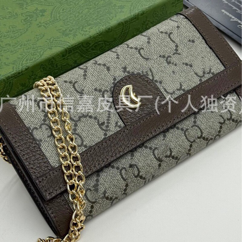 Genuine leather long women's party wallet with metal logo tag, genuine leather women's wallet, crossbody clutch bag from an old factory Genuine leather long women's party wallet with metal logo tag, genuine leather women's wallet, crossbody clutch bag from an old factory