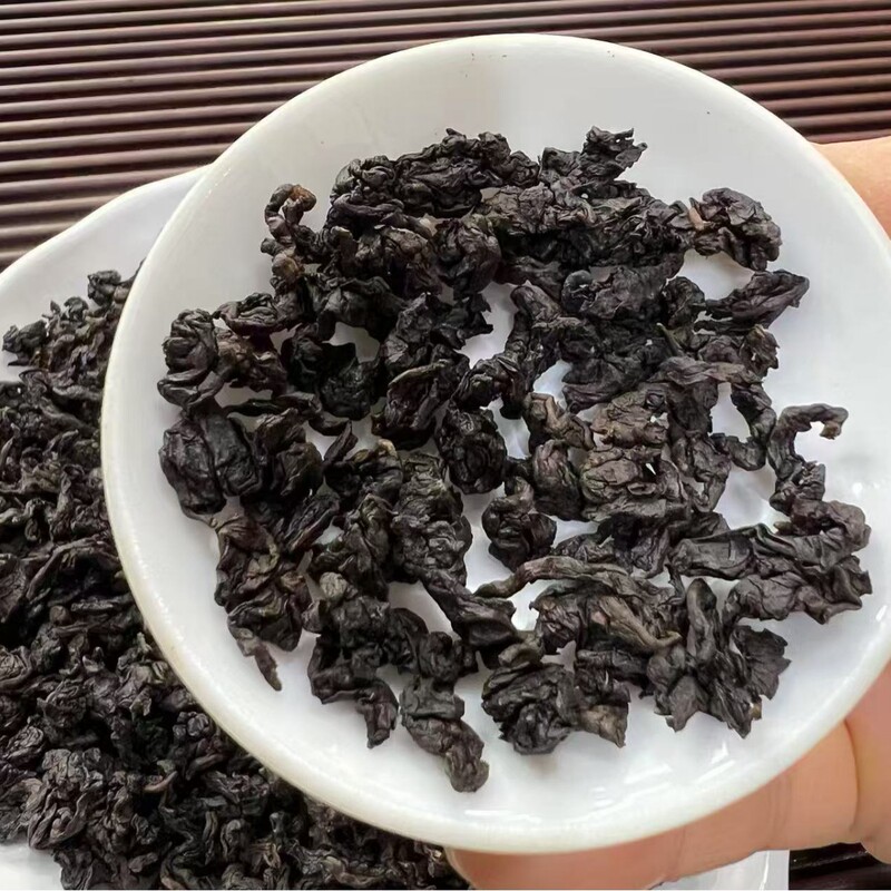 Black Oolong tea fragrant carbon baked Tieguanyin cooked tea Oolong fragrant cooked tea milk tea raw materials Black Oolong tea fragrant carbon baked Tieguanyin cooked tea Oolong fragrant cooked tea milk tea raw materials