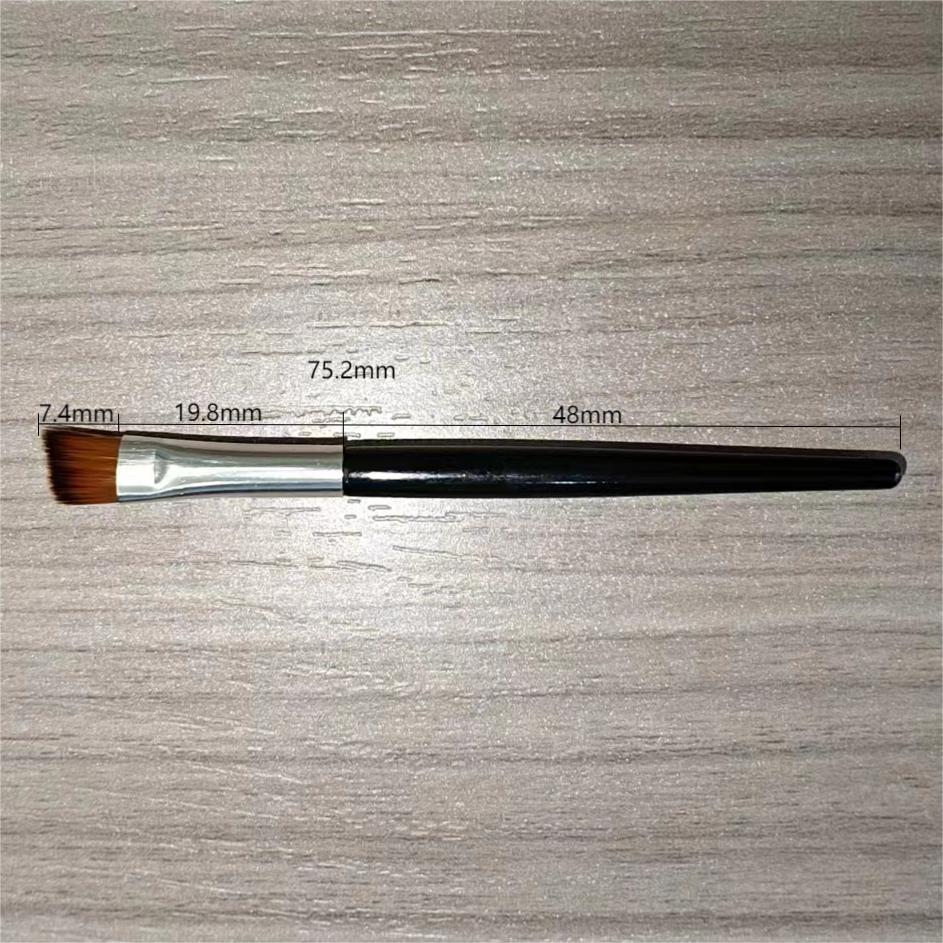 Mini Eyebrow Brush Image 1