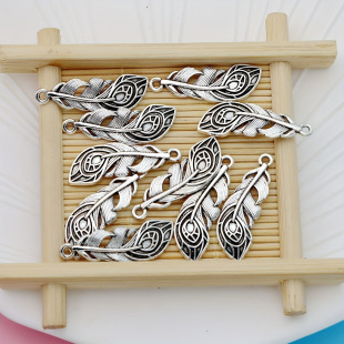 Factory wholesale ancient silver simple zinc alloy retro feather leaf pendant DIY jewelry bracelet earrings accessories