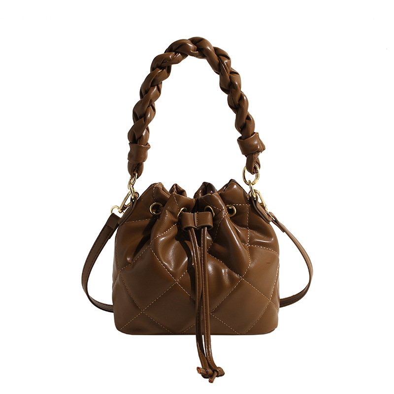 2024 primavera nueva textura de alta calidad de gran capacidad de extracción de cinturón de diamante estilo simple retro bolso de mujer de cubo de aire